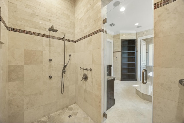 bathroom featuring a shower with shower door and tile walls