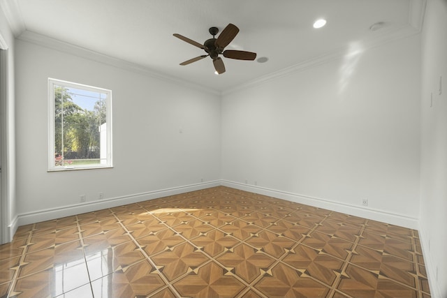 empty room with ceiling fan, ornamental molding, and parquet floors