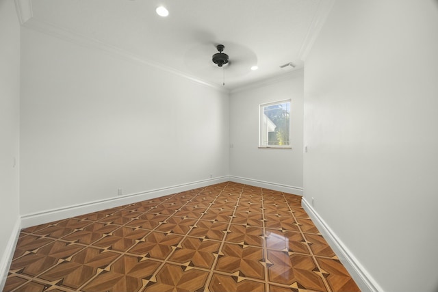 unfurnished room featuring parquet flooring, ceiling fan, and ornamental molding