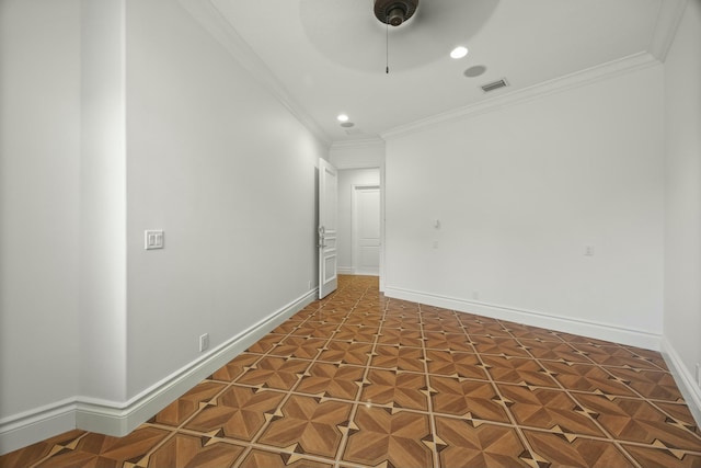 empty room with dark parquet flooring, ceiling fan, and crown molding