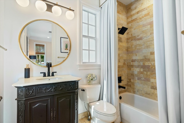 full bathroom with toilet, vanity, and shower / tub combo with curtain