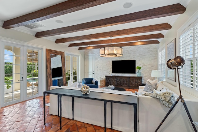 living room featuring beamed ceiling, french doors, and a notable chandelier