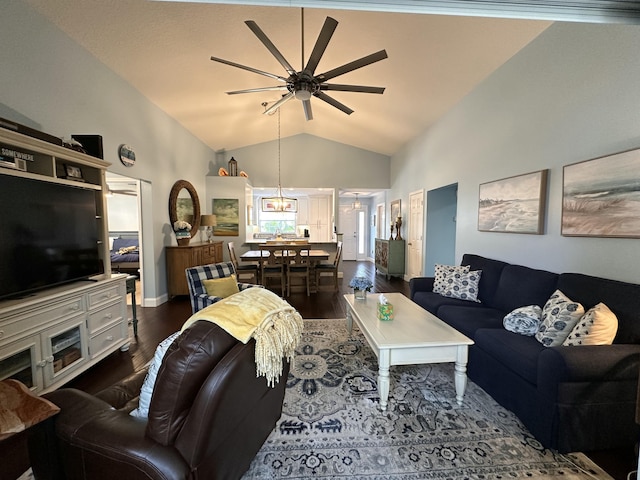 living room with dark hardwood / wood-style flooring, ceiling fan, and lofted ceiling