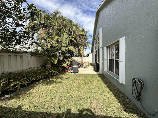 view of yard with a patio area