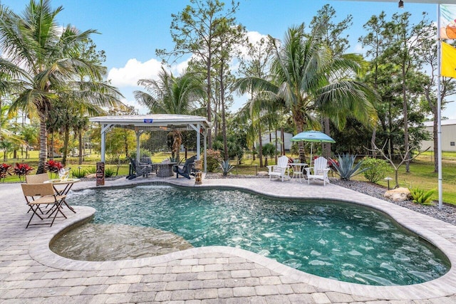 view of swimming pool featuring a gazebo and a patio