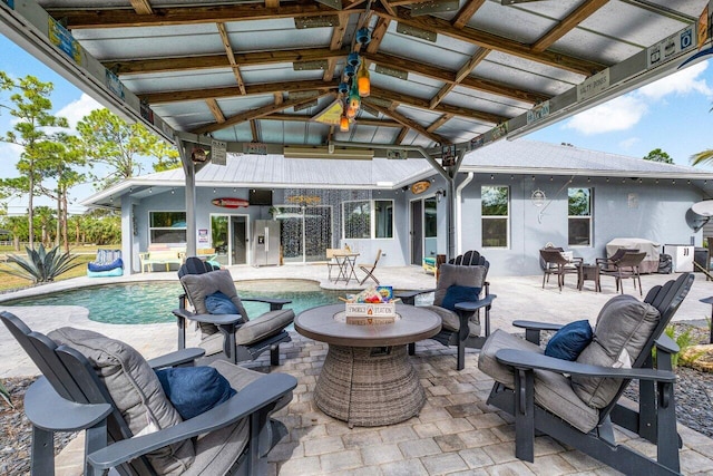 view of patio featuring a fire pit