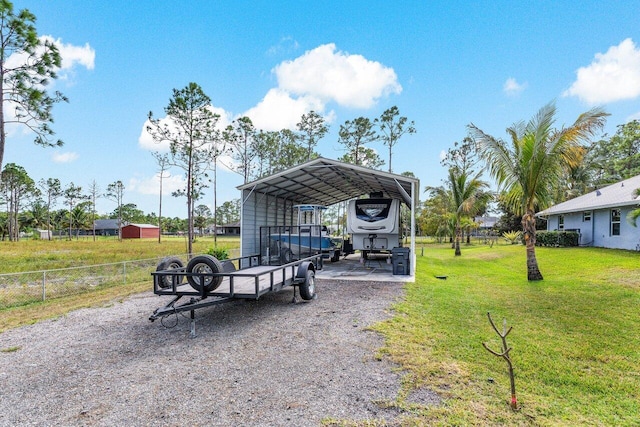 view of yard with a carport