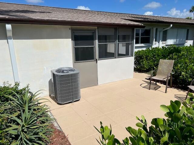 view of patio with central AC