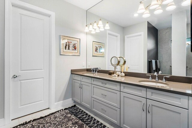 bedroom with a tray ceiling and ceiling fan