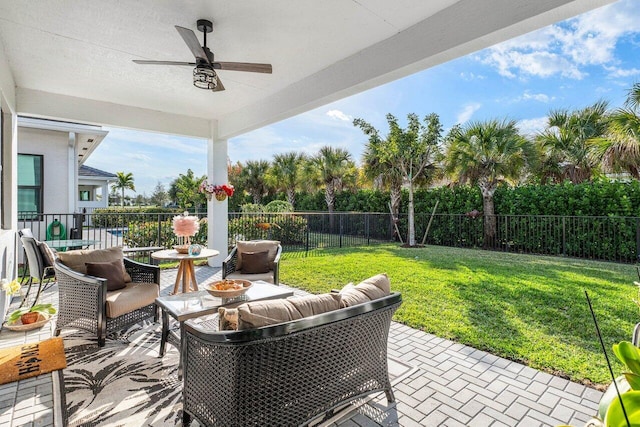 view of patio / terrace featuring ceiling fan