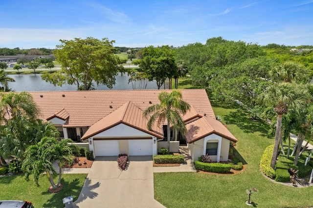 aerial view featuring a water view