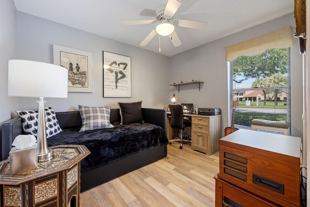 interior space featuring light wood-type flooring and ceiling fan