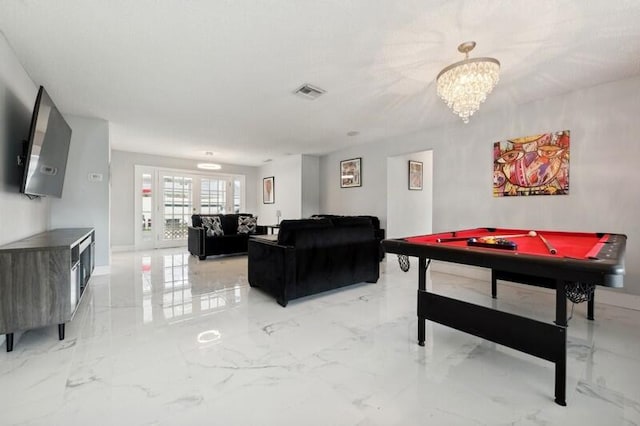 rec room with french doors, a notable chandelier, and pool table