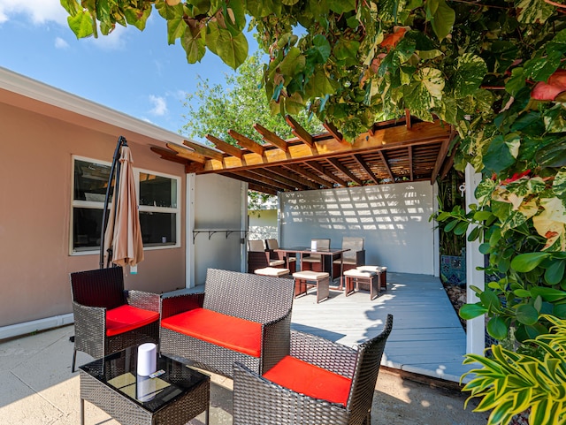 view of patio / terrace featuring a pergola and a deck