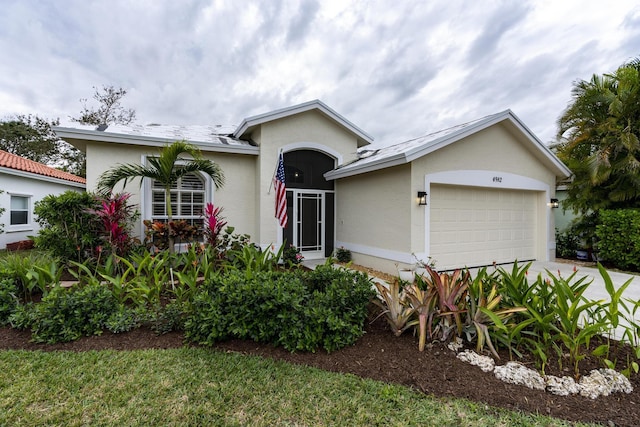 single story home with a garage