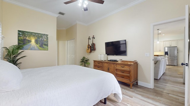 bedroom with ensuite bath, ceiling fan, ornamental molding, light hardwood / wood-style floors, and stainless steel fridge with ice dispenser