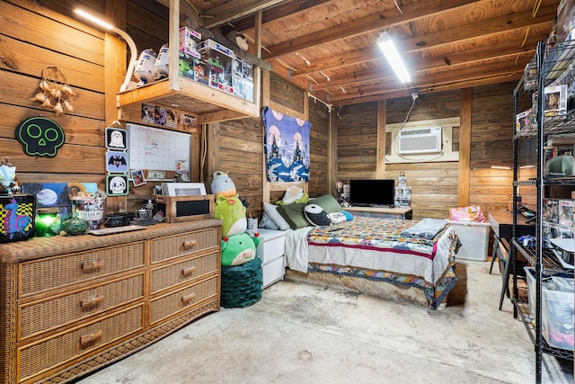 bedroom featuring wooden walls, beamed ceiling, concrete floors, and wooden ceiling