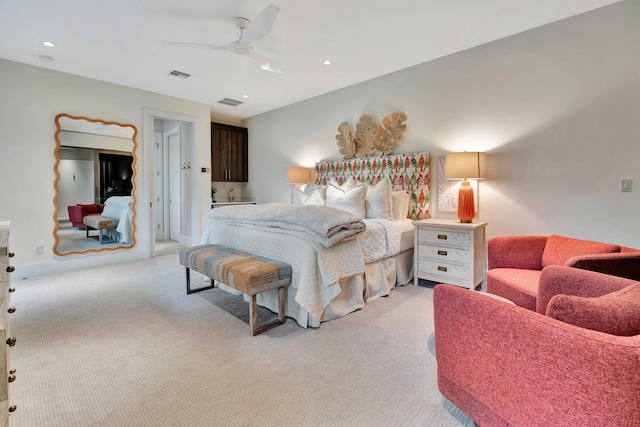 bedroom featuring light carpet and ceiling fan