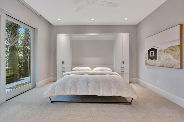 carpeted bedroom with access to exterior and ceiling fan