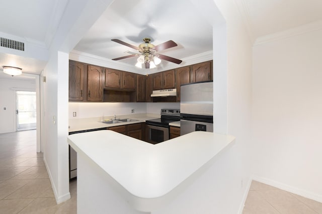 kitchen with kitchen peninsula, ceiling fan, appliances with stainless steel finishes, light tile patterned flooring, and dark brown cabinetry