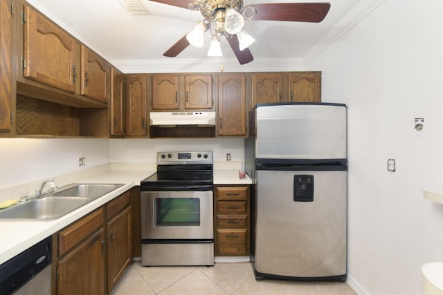 kitchen featuring sink, ceiling fan, light tile patterned floors, ornamental molding, and appliances with stainless steel finishes