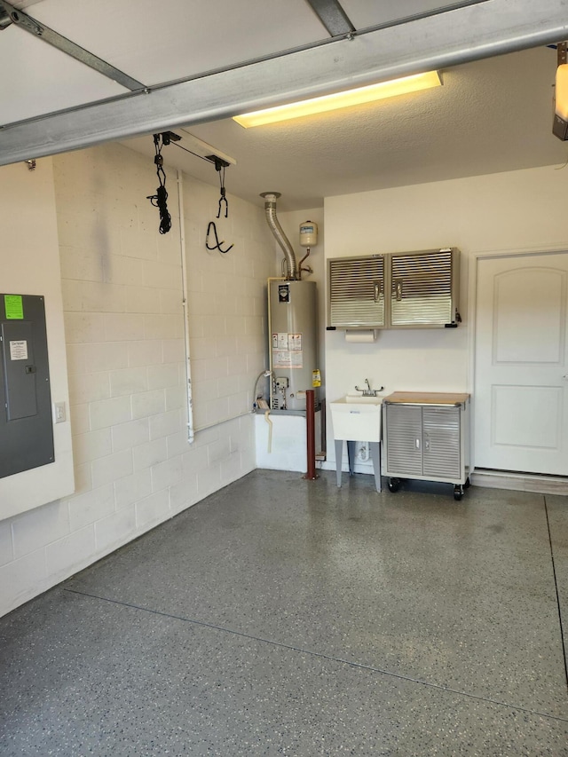 garage with electric panel, water heater, and sink