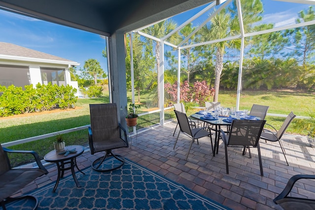 view of patio with a lanai