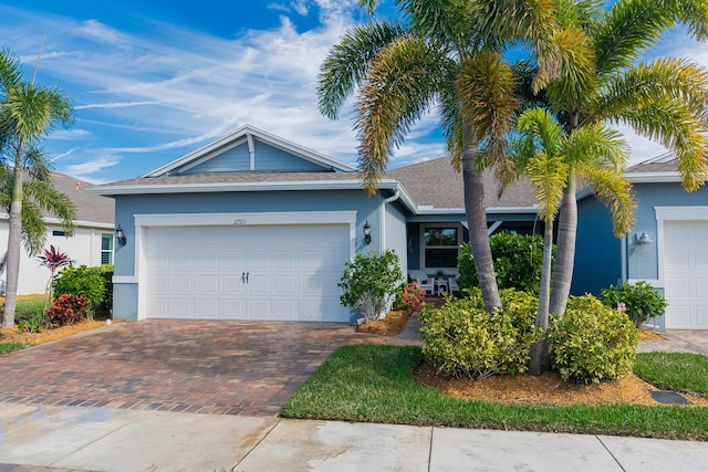 ranch-style house featuring a garage