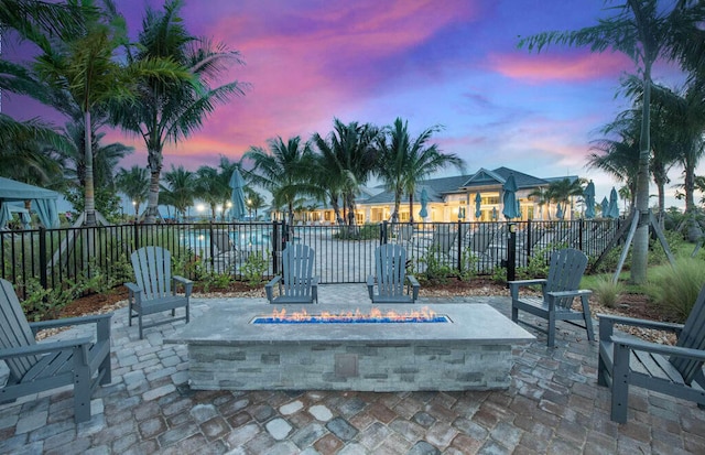 patio terrace at dusk with an outdoor fire pit