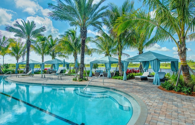 view of pool with a gazebo and a patio area