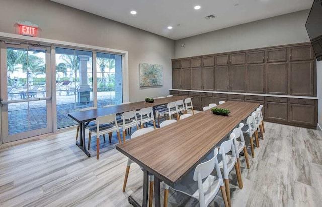 dining room with light hardwood / wood-style floors