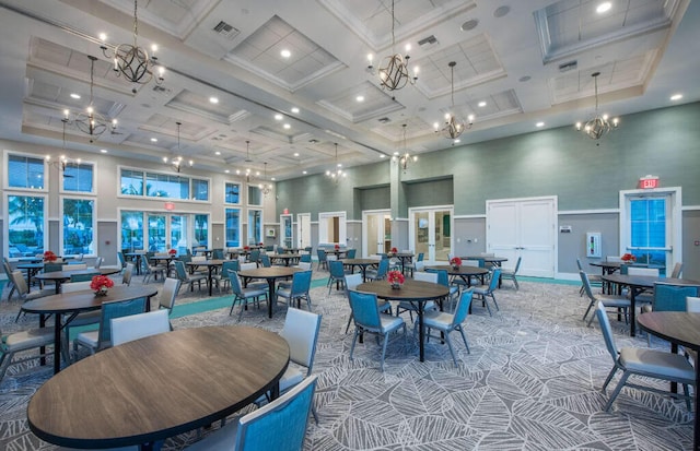 carpeted dining room featuring coffered ceiling, a towering ceiling, and beamed ceiling