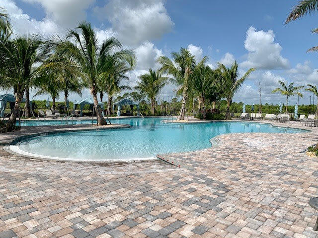 view of swimming pool with a patio