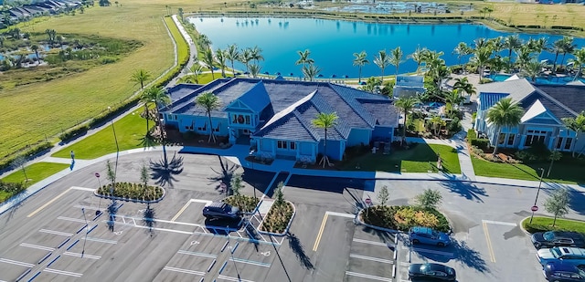 drone / aerial view with a water view