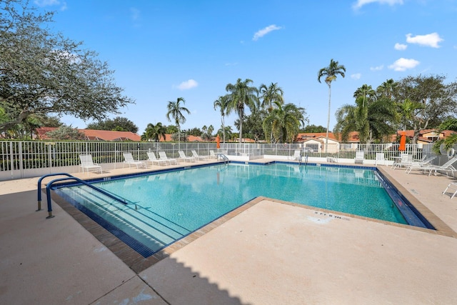 view of pool featuring a patio