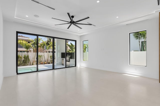 237 NE 11th St, Delray Beach, FL 33444 - spare room featuring plenty of natural light, a ceiling fan, and recessed lighting