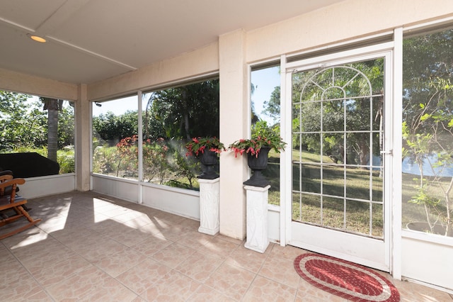 sunroom / solarium featuring plenty of natural light