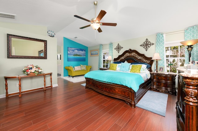 bedroom featuring ceiling fan, wood-type flooring, and lofted ceiling