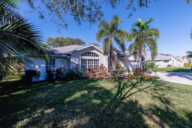 single story home with a front yard