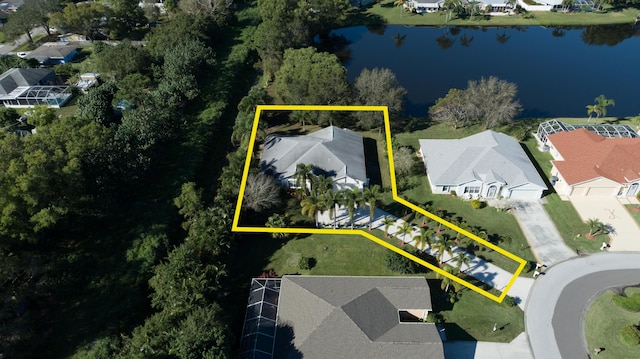 birds eye view of property featuring a water view