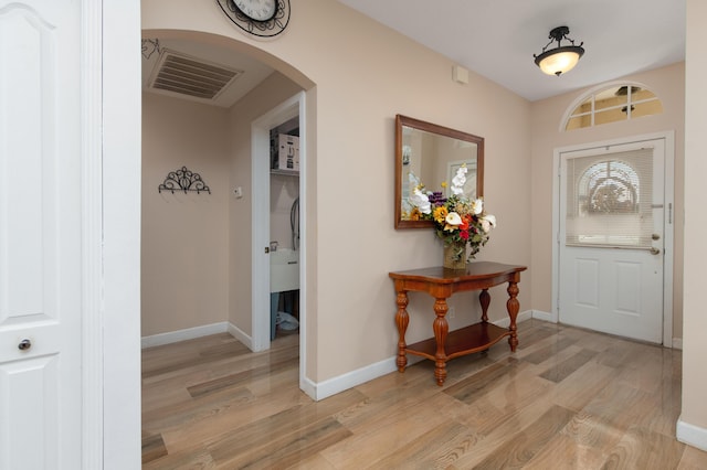 foyer entrance featuring light hardwood / wood-style flooring