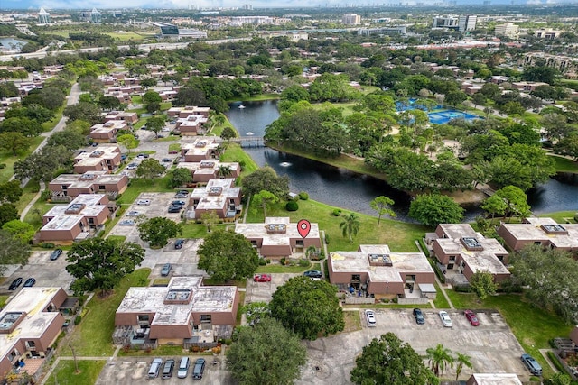 drone / aerial view with a water view