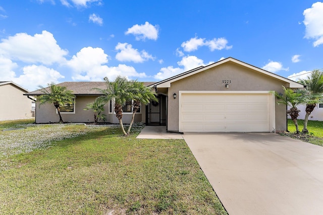 ranch-style house featuring a garage and a front lawn