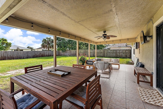 view of patio with ceiling fan and an outdoor hangout area