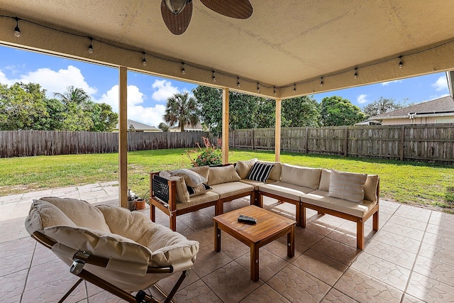 view of patio featuring outdoor lounge area and ceiling fan