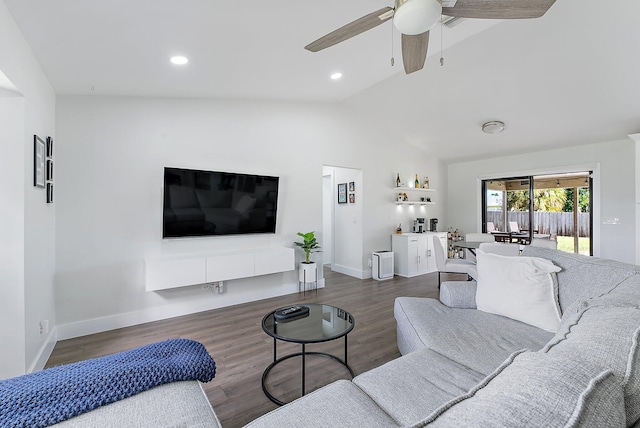 living room featuring dark hardwood / wood-style floors, ceiling fan, and lofted ceiling