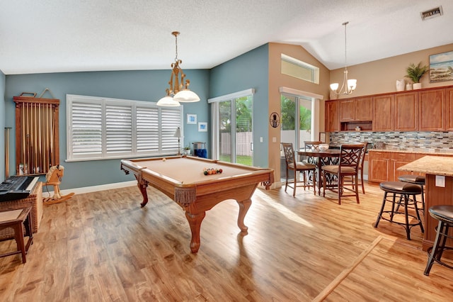 rec room featuring lofted ceiling, billiards, and light hardwood / wood-style flooring