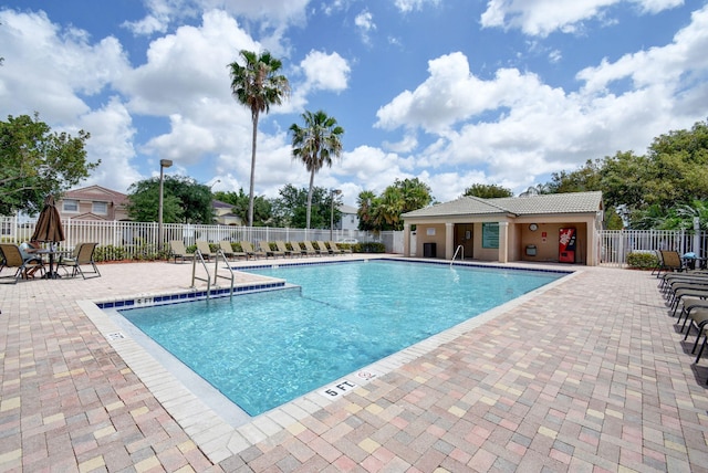 view of swimming pool with a patio area