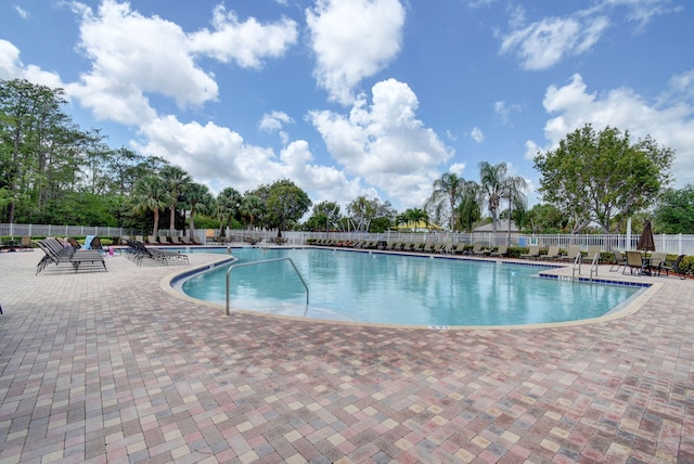 view of pool featuring a patio