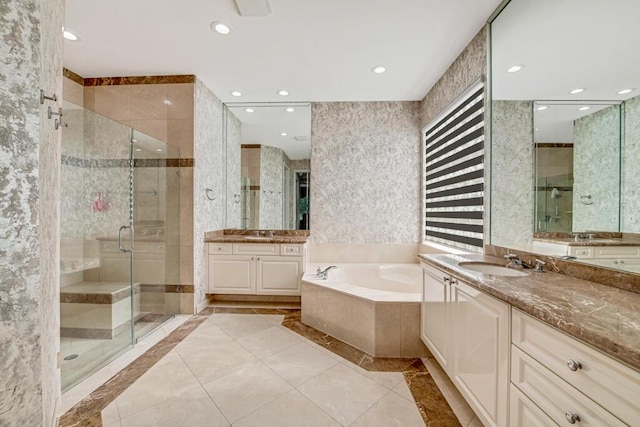 bathroom with separate shower and tub, tile patterned floors, and vanity